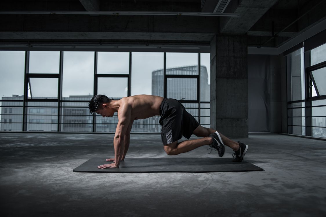 Pair of dumbbells on a gym floor ready for a strength training session